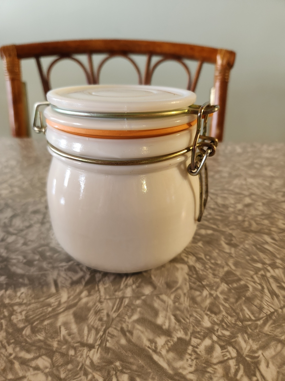 Source Unknown White Ceramic Jar with Orange Seal and Metal Clamp